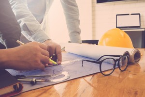 Architect concept, Architects working with blueprints in the office, Vintage Effect